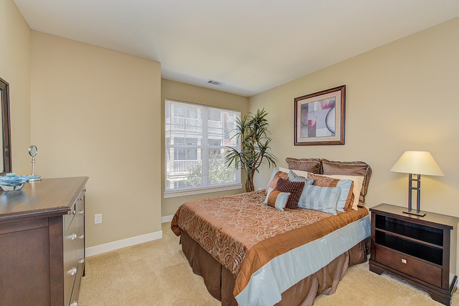 Stylish apartment bedroom in neutral tones